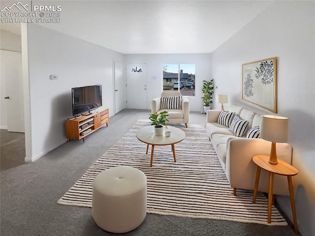 living area featuring carpet floors