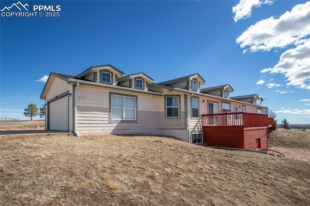 view of front of property featuring an attached garage and concrete driveway
