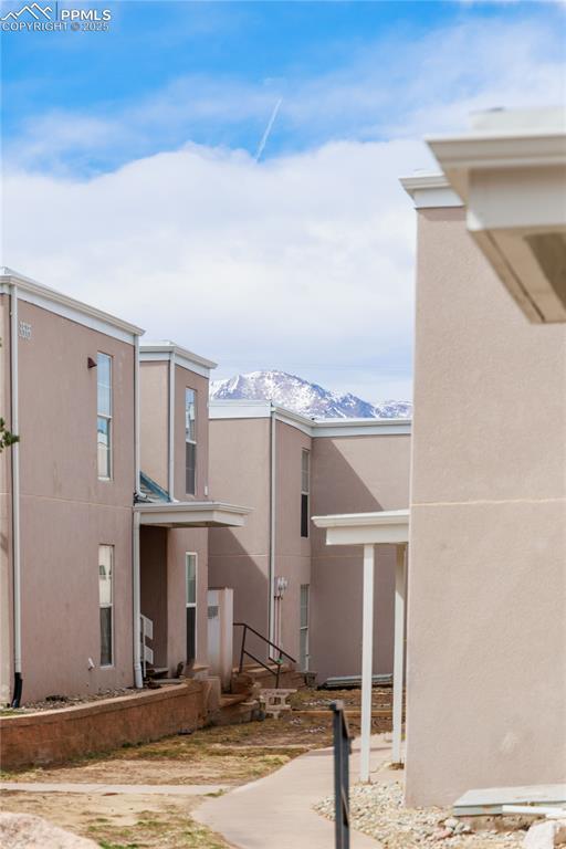 exterior space featuring a mountain view