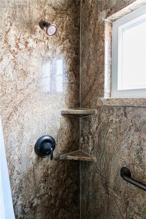 room details with a tile shower