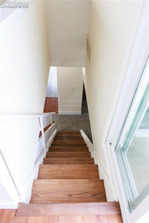 stairs featuring visible vents