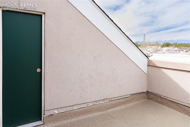 view of side of property featuring stucco siding