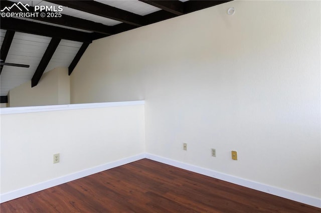 empty room with baseboards, vaulted ceiling with beams, wood finished floors, and wooden ceiling