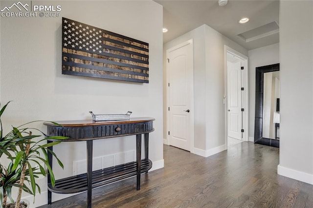 hall with recessed lighting, baseboards, and wood finished floors