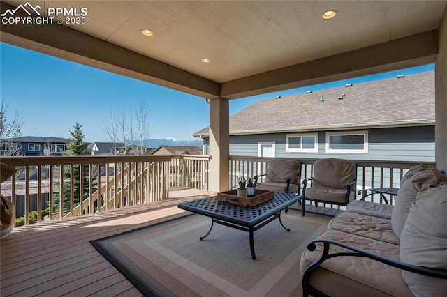 deck with an outdoor living space
