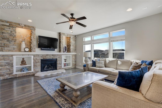 living area with recessed lighting, a fireplace, dark wood-type flooring, and ceiling fan