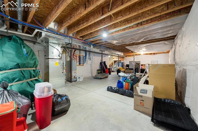 4454 College Park Ct, Colorado Springs, CO 80918 - unfinished below grade area featuring water heater