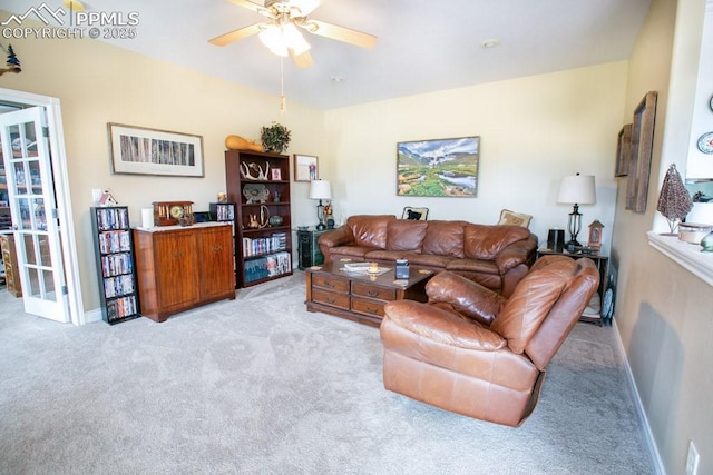 17035 Herring Rd, Colorado Springs, CO 80908 - living room featuring ceiling fan, light carpet, and baseboards