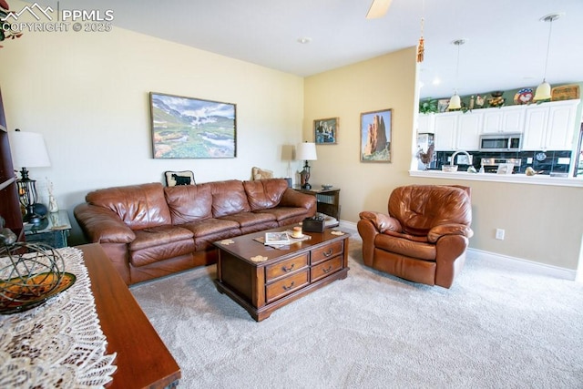 17035 Herring Rd, Colorado Springs, CO 80908 - living room featuring carpet flooring and baseboards