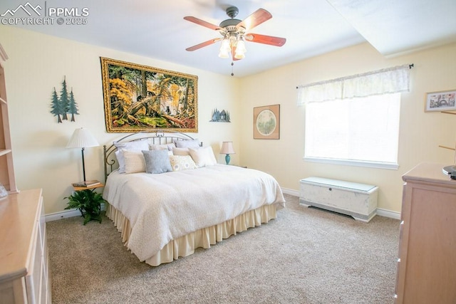 17035 Herring Rd, Colorado Springs, CO 80908 - bedroom featuring baseboards, a ceiling fan, and light colored carpet
