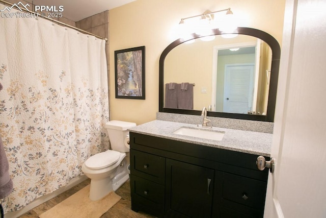 17035 Herring Rd, Colorado Springs, CO 80908 - full bath featuring curtained shower, vanity, and toilet