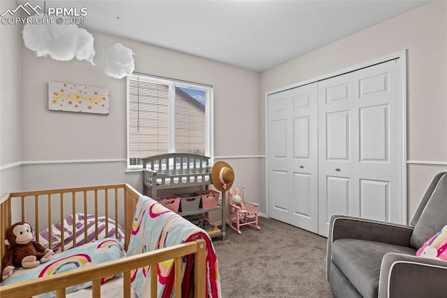 carpeted bedroom featuring a closet