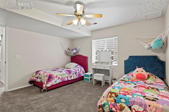 bedroom featuring baseboards, a ceiling fan, visible vents, and carpet floors