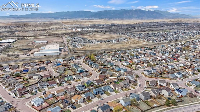 bird's eye view with a mountain view and a residential view