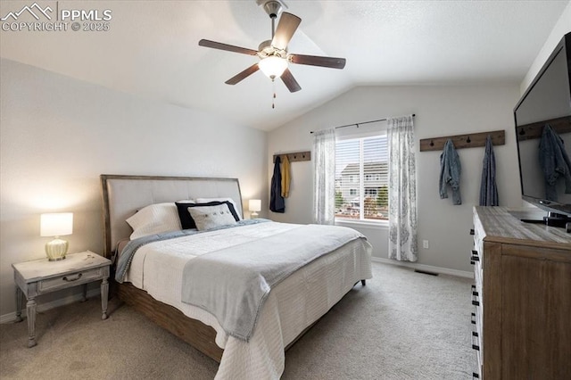 13424 Stone Valley Dr, Peyton, CO 80831 - bedroom featuring baseboards, light colored carpet, and vaulted ceiling