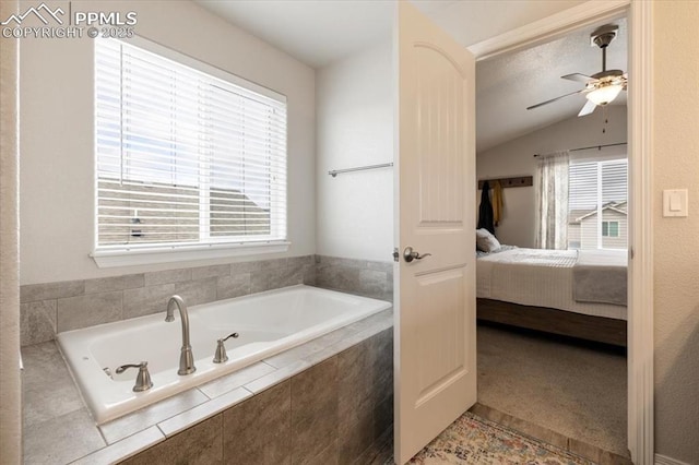 13424 Stone Valley Dr, Peyton, CO 80831 - full bath with ensuite bathroom, a bath, a ceiling fan, and lofted ceiling