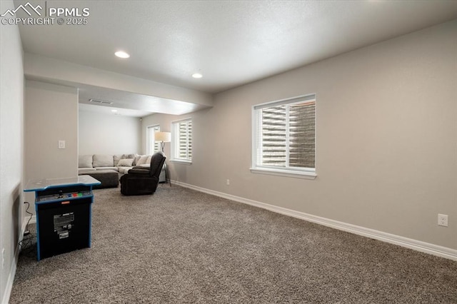 13424 Stone Valley Dr, Peyton, CO 80831 - sitting room featuring visible vents, baseboards, carpet, and recessed lighting