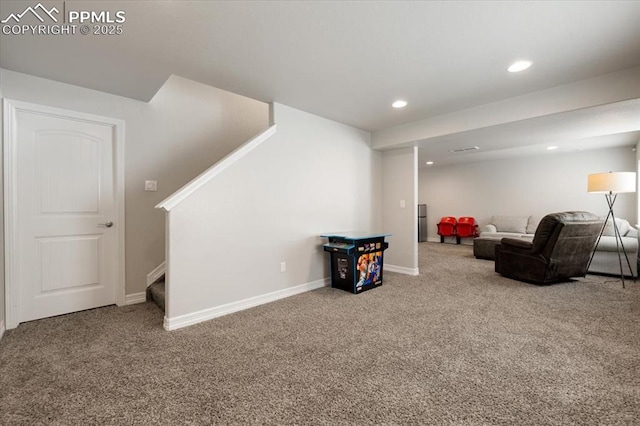 13424 Stone Valley Dr, Peyton, CO 80831 - carpeted living room featuring baseboards, stairway, and recessed lighting