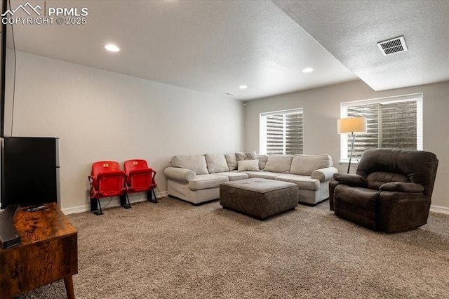 13424 Stone Valley Dr, Peyton, CO 80831 - living area with recessed lighting, carpet flooring, visible vents, and baseboards