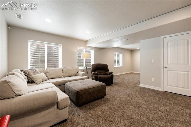 13424 Stone Valley Dr, Peyton, CO 80831 - living area featuring carpet floors, baseboards, recessed lighting, and visible vents