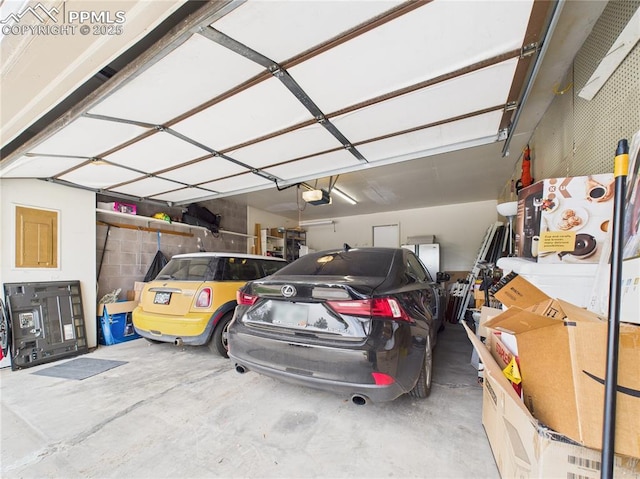 garage featuring a garage door opener