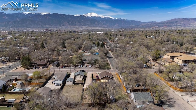 drone / aerial view with a residential view and a mountain view