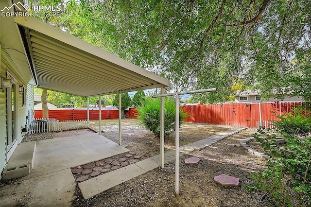 view of patio featuring a fenced backyard