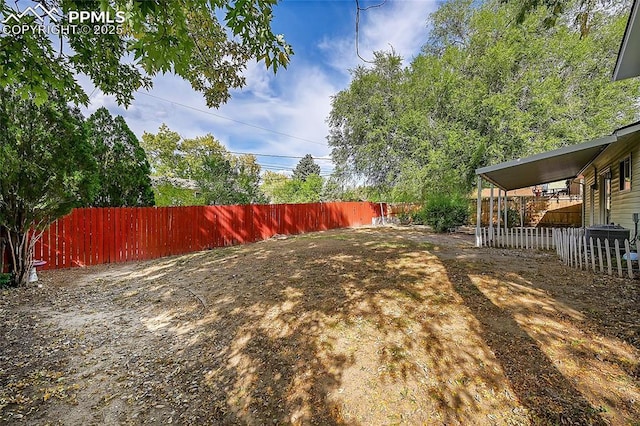 view of yard with a fenced backyard
