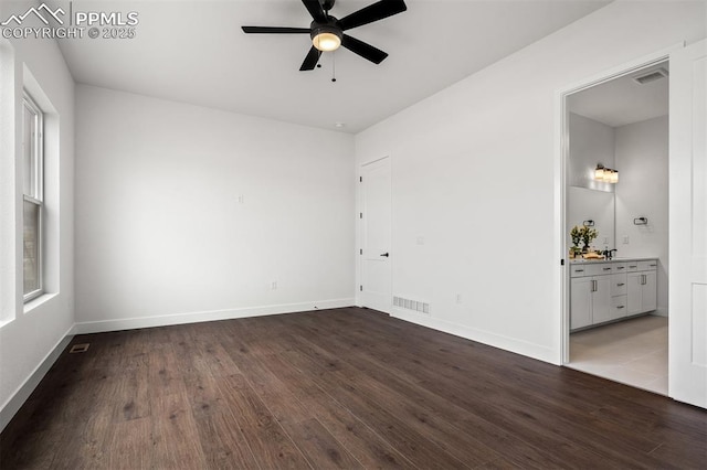 6678 Thimble Ct, Colorado Springs, CO 80924 - unfurnished room with ceiling fan, dark wood-style floors, and baseboards