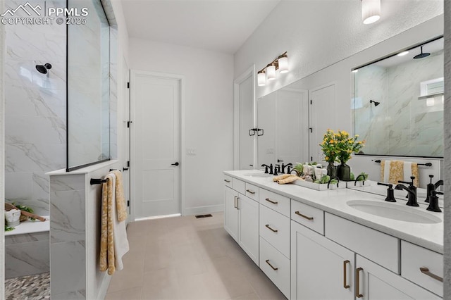 6678 Thimble Ct, Colorado Springs, CO 80924 - full bath with a marble finish shower and double vanity