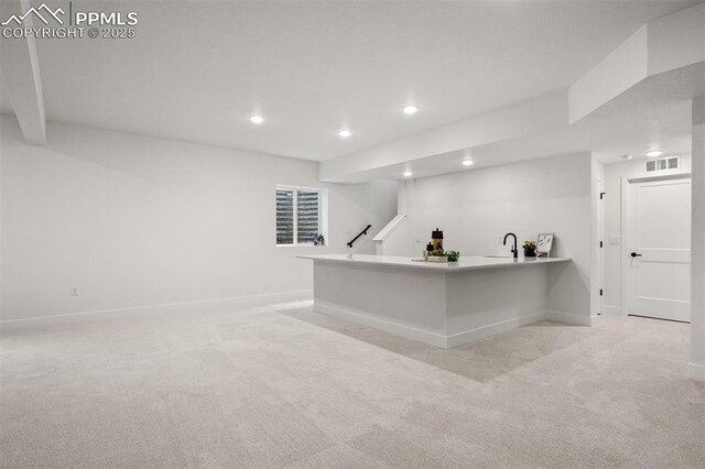 6678 Thimble Ct, Colorado Springs, CO 80924 - bar area with light colored carpet, recessed lighting, baseboards, and a sink