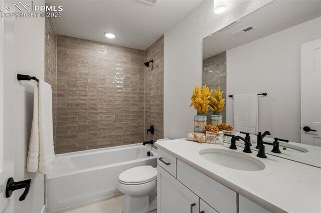 6678 Thimble Ct, Colorado Springs, CO 80924 - full bathroom featuring  shower combination, toilet, vanity, and tile patterned flooring