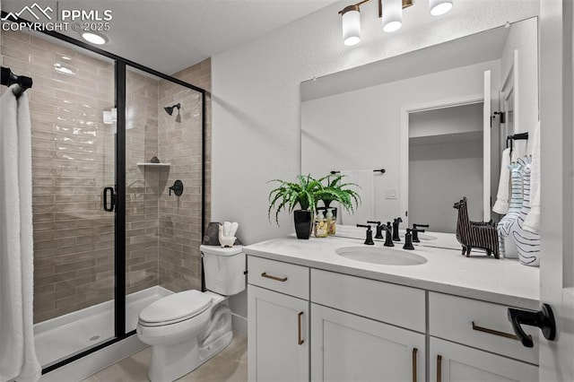 6678 Thimble Ct, Colorado Springs, CO 80924 - full bath featuring a shower stall, vanity, and toilet