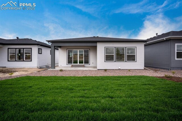 6678 Thimble Ct, Colorado Springs, CO 80924 - rear view of house featuring a yard and a patio