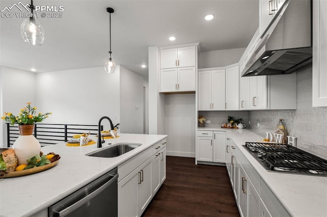 6678 Thimble Ct, Colorado Springs, CO 80924 - kitchen with appliances with stainless steel finishes, a sink, under cabinet range hood, recessed lighting, and dark wood-style floors