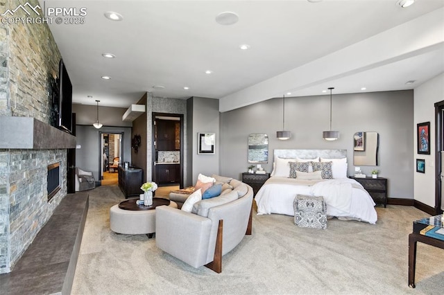 3870 S Club Dr, Colorado Springs, CO 80906 - carpeted bedroom featuring a large fireplace and recessed lighting