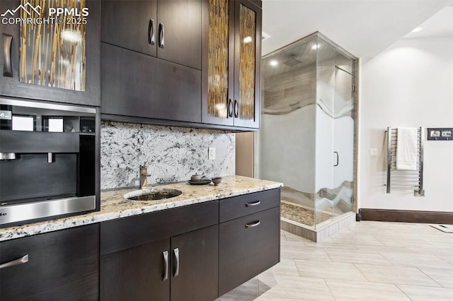 3870 S Club Dr, Colorado Springs, CO 80906 - interior space with tasteful backsplash, baseboards, recessed lighting, vanity, and a stall shower