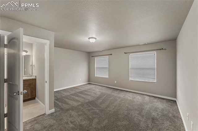 4691 Pleasant Port Vw, Colorado Springs, CO 80911 - empty room featuring baseboards, visible vents, carpet floors, and a textured ceiling