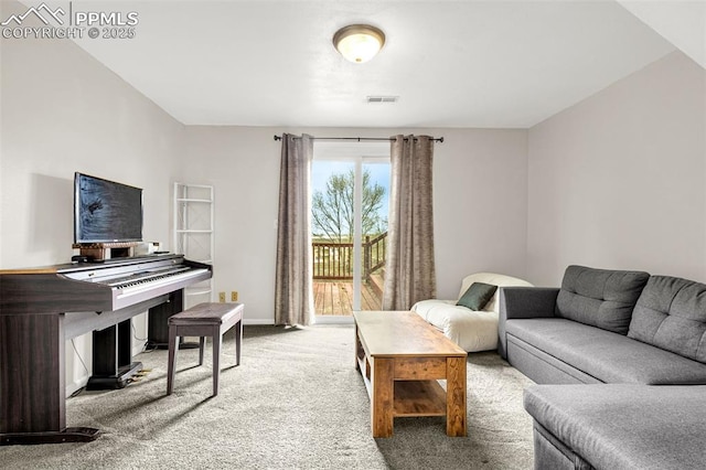 7775 Woody Creek Dr, Colorado Springs, CO 80911 - living area with carpet, baseboards, and visible vents