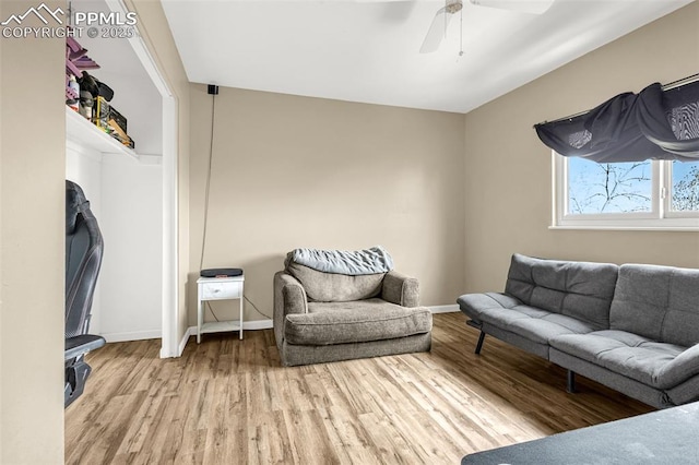 7775 Woody Creek Dr, Colorado Springs, CO 80911 - living room with baseboards, wood finished floors, and a ceiling fan