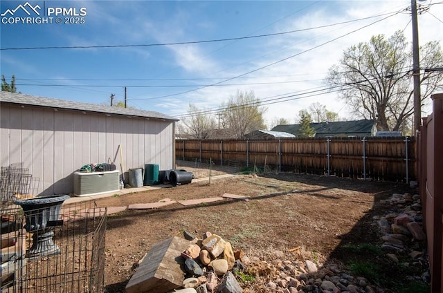 view of yard with a fenced backyard