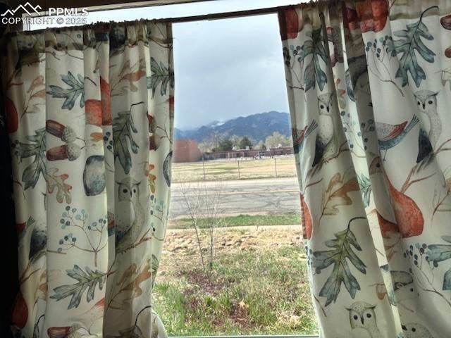 interior details with a mountain view and a rural view