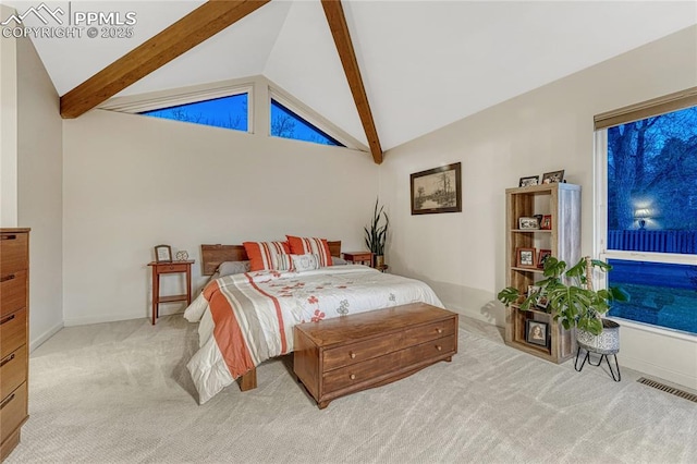 2372 Wood Ave, Colorado Springs, CO 80907 - carpeted bedroom featuring lofted ceiling with beams, baseboards, and visible vents