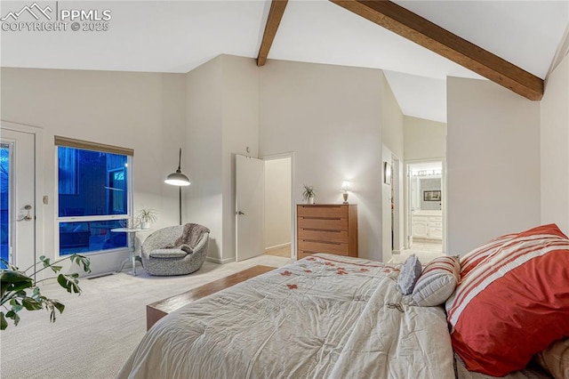 2372 Wood Ave, Colorado Springs, CO 80907 - carpeted bedroom with connected bathroom, beamed ceiling, and high vaulted ceiling