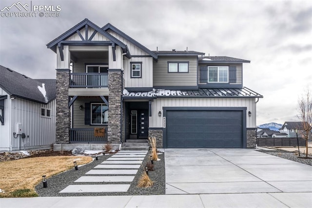 8225 Harvey Logan Dr, Colorado Springs, CO 80908 - craftsman house featuring driveway, stone siding, a garage, and board and batten siding