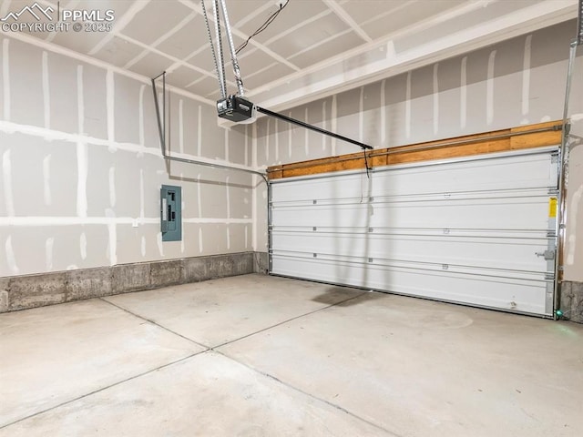 garage with electric panel and a garage door opener