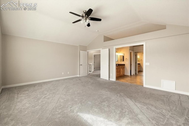 15110 Copperfield Dr, Colorado Springs, CO 80921 - unfurnished bedroom featuring carpet flooring, baseboards, lofted ceiling, and ensuite bath