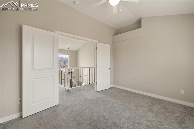 15110 Copperfield Dr, Colorado Springs, CO 80921 - spare room with baseboards, carpet, vaulted ceiling, and a ceiling fan