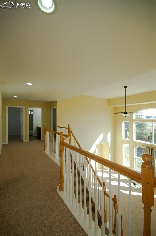 9443 St George Rd, Peyton, CO 80831 - hall with recessed lighting, an upstairs landing, and light colored carpet