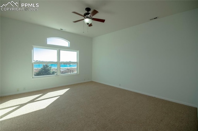 9443 St George Rd, Peyton, CO 80831 - unfurnished room featuring carpet flooring, visible vents, baseboards, and a ceiling fan
